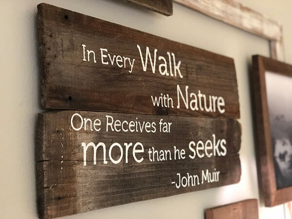 Personalized John Muir quote sign on handcrafted rustic wood planks for a unique, one-of-a-kind look by Urban Garden Studio Eco-friendly wood sign with personalized John Muir quote and vintage-inspired design on reclaimed wood planks by Urban Garden Studio