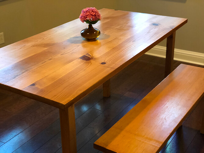 Custom rustic pine harvest farm table by Urban Garden Studio Upgrade your dining experience with a one-of-a-kind reclaimed wood dining room table stained in walnut by Urban Garden Studio, expertly handcrafted from sustainable materials for a unique and eco-friendly addition to your home decor.