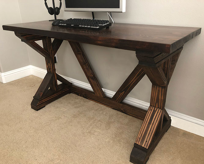 Upgrade your home office with a rustic reclaimed wood desk by Urban Garden Studio, expertly handcrafted for a unique and sustainable addition to your workspace. This desk combines functionality and style, adding natural beauty and charm to your home decor.