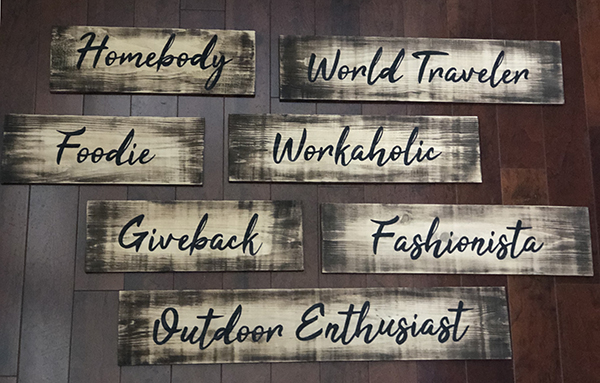 Unique hand-painted barn wood signage for a company swag store with custom branding and design by Urban Garden Studio