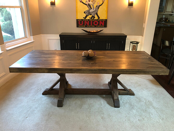 Rustic farm table, expertly handcrafted from reclaimed wood for a sustainable and eco-friendly addition to your home decor. This charming and unique table combines natural materials and farmhouse design. Custom barn wood furniture.