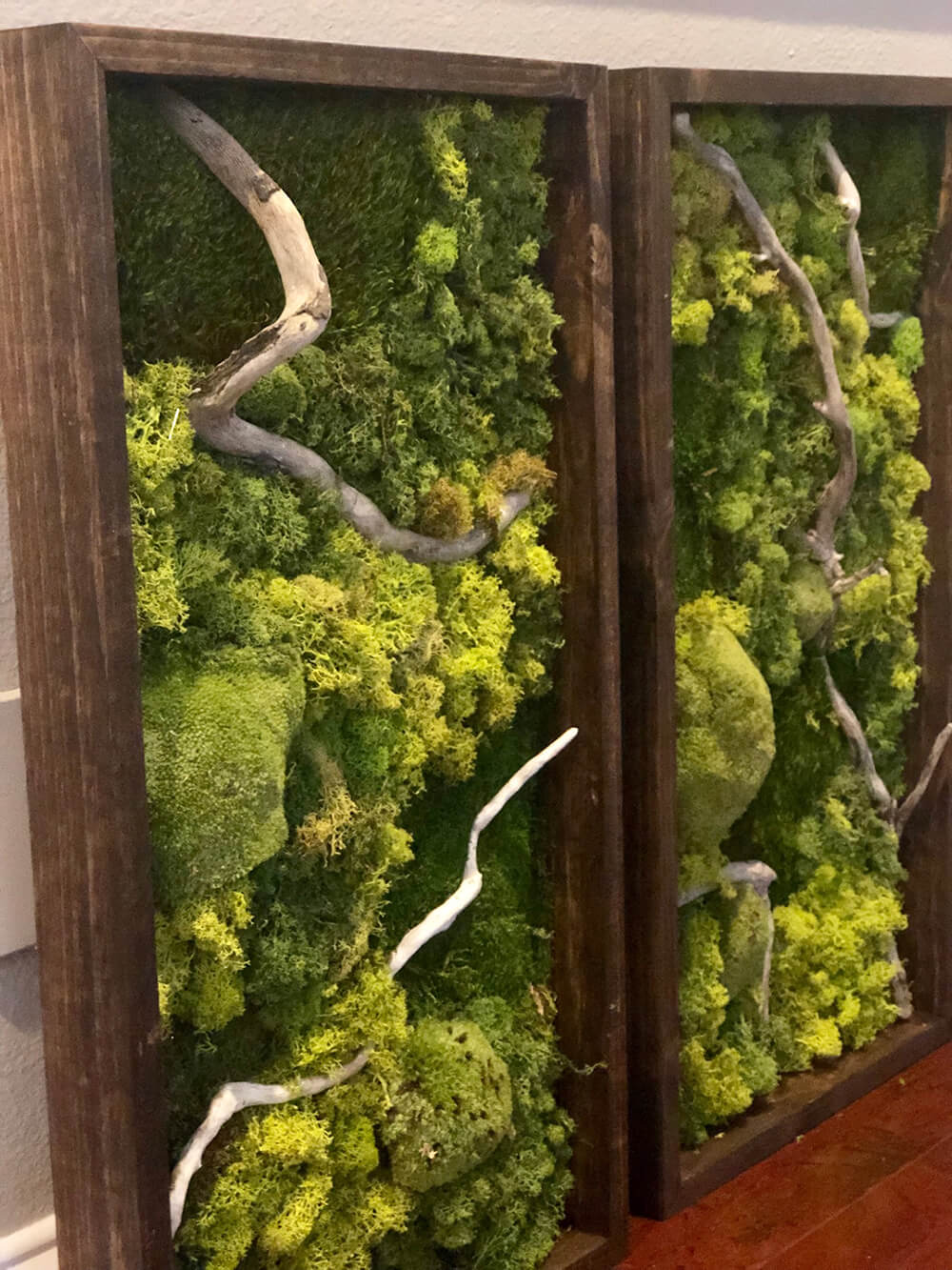 Preserved moss wall art utilizing a variety of preserved moss; cushion moss, mood moss and pool moss. For eco-friendly interiors