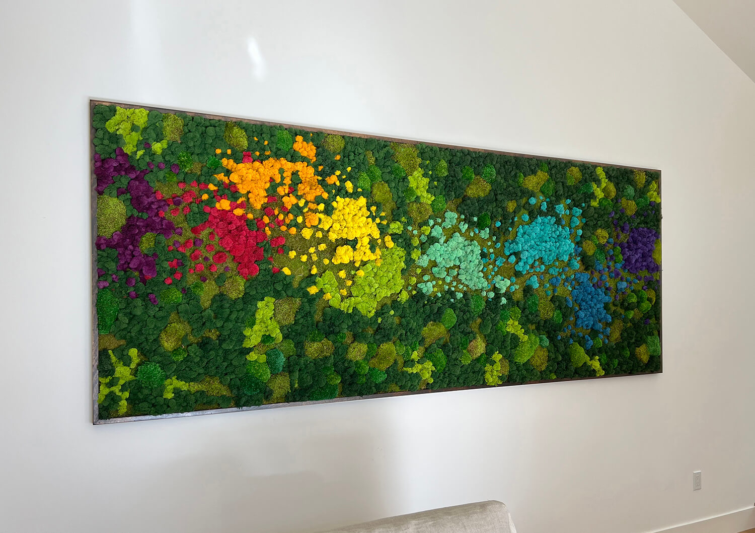 Colorful preserved wall art created with reindeer moss with many different colors creating moss abstract art.