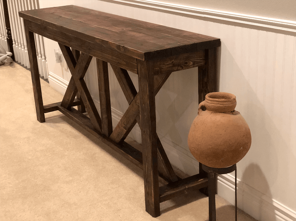 Add a touch of rustic charm to your home decor with a handcrafted barn wood console table by Urban Garden Studio, expertly designed from reclaimed materials for a unique and sustainable accent piece in any room.