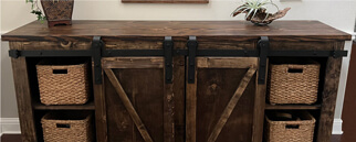 Custom rustic barn wood console table with sliding barn doors by urban garden studio.