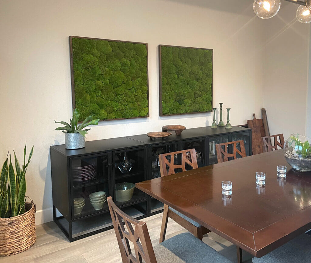 Framed preserved moss wall art created with moss panels of solid cushion moss framed out in rustic wood.