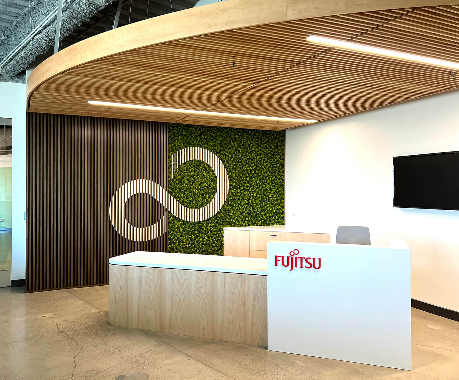 Enhance your brand identity with a captivating moss signage wall crafted by Urban Garden Studio. Elevate your corporate logo using sustainable reindeer moss, creating an eco-friendly and visually striking installation.